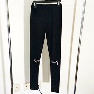Black leggings eye